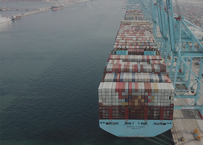 Picture of Maersk ship loaded with containers at a port