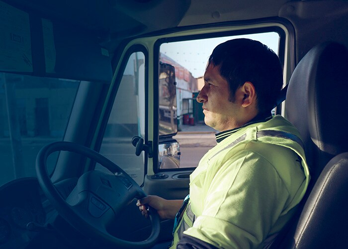A man in a yellow vest