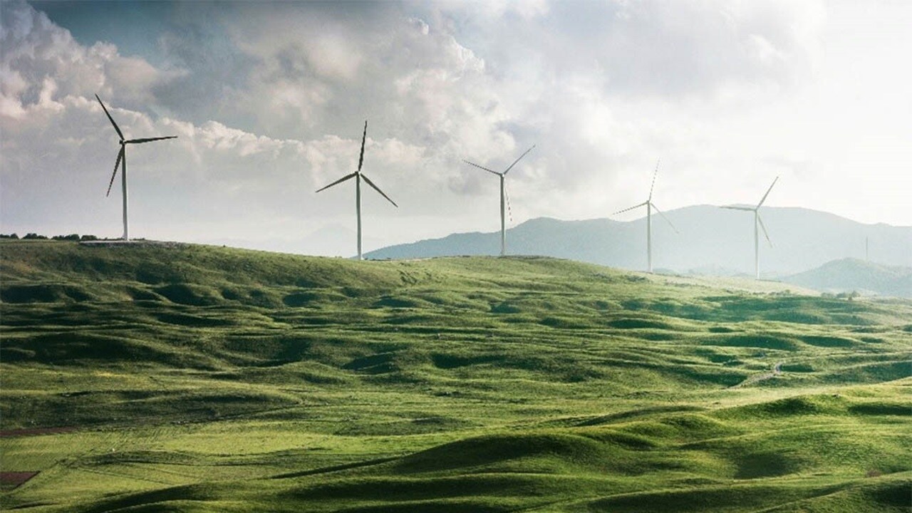 Wind turbines on green hills