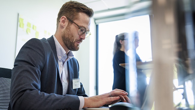Employee at work on the Laptop