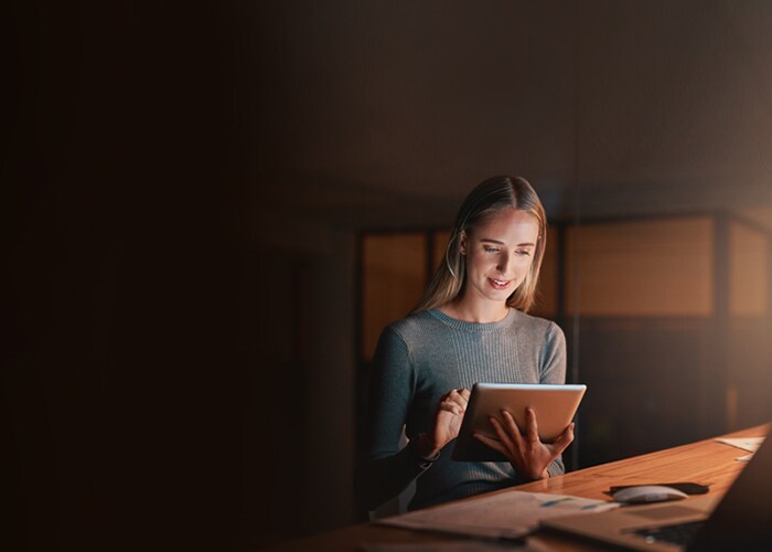 A businesswoman using a digital tablet