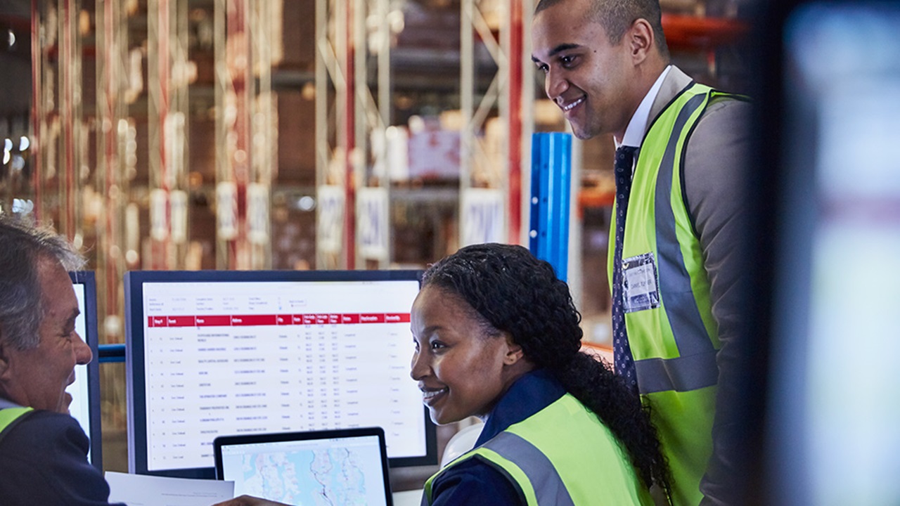 reviewing shipment and inventory data on computer