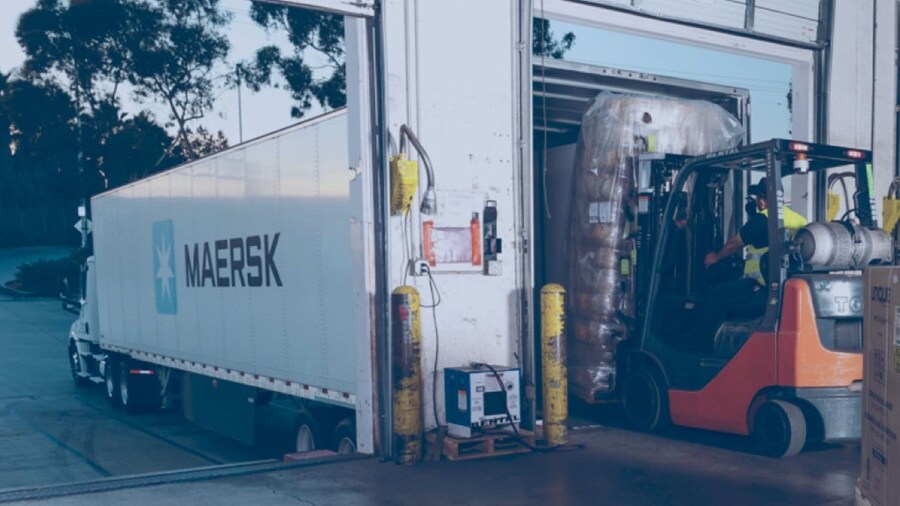Loading shipments using a forklift into Maersk truck