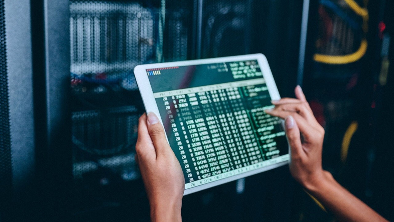 Close up shot of a set of hands using a tablet