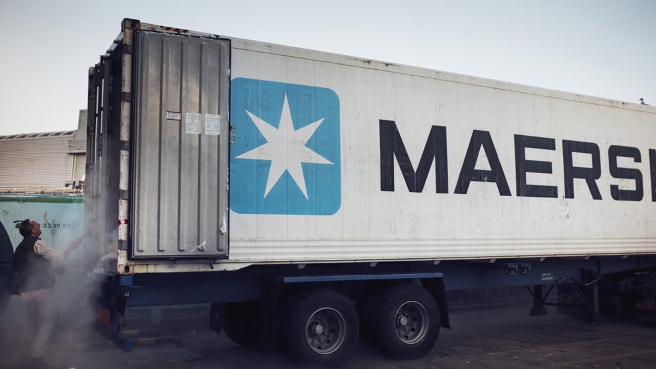 Maersk shipping container at a loading facility.