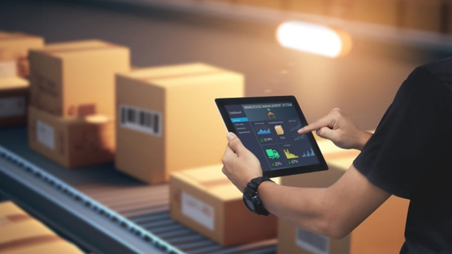 A sets of hands holding a tablet