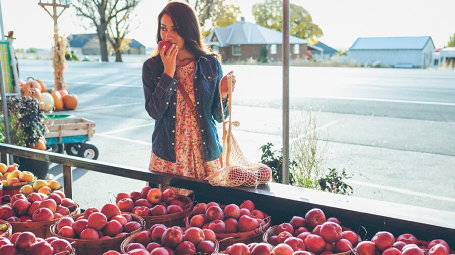Female buying apples