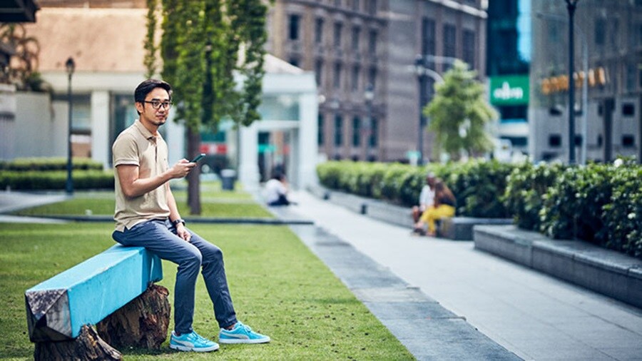 Man on blue bench