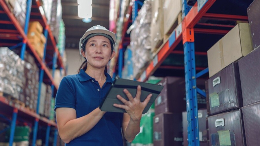 Picture of a woman standing in the warehouse