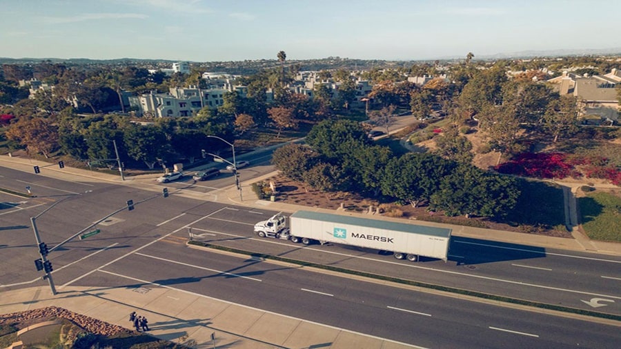 Maersk truck driving on the road.