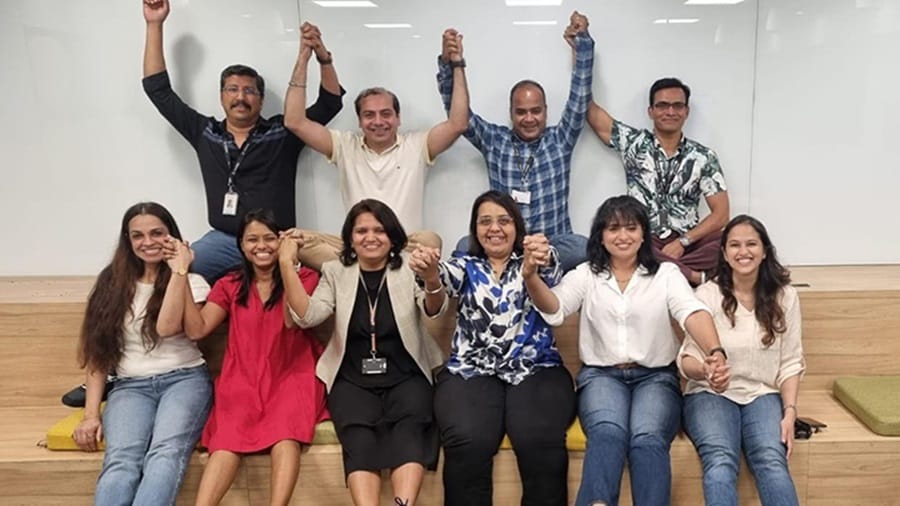 Team raising hands