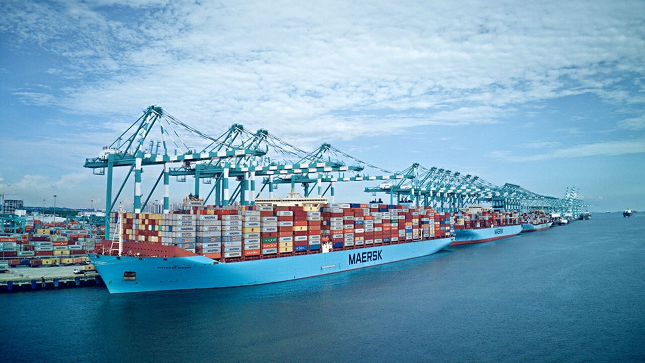 Three Maersk vessels at berth in a port