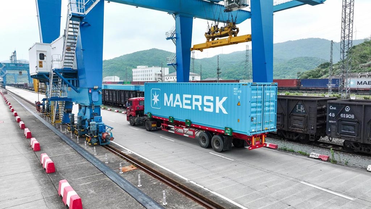 blue new container at train deport rail yard in china