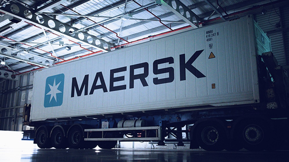 A Maersk container loaded on a truck