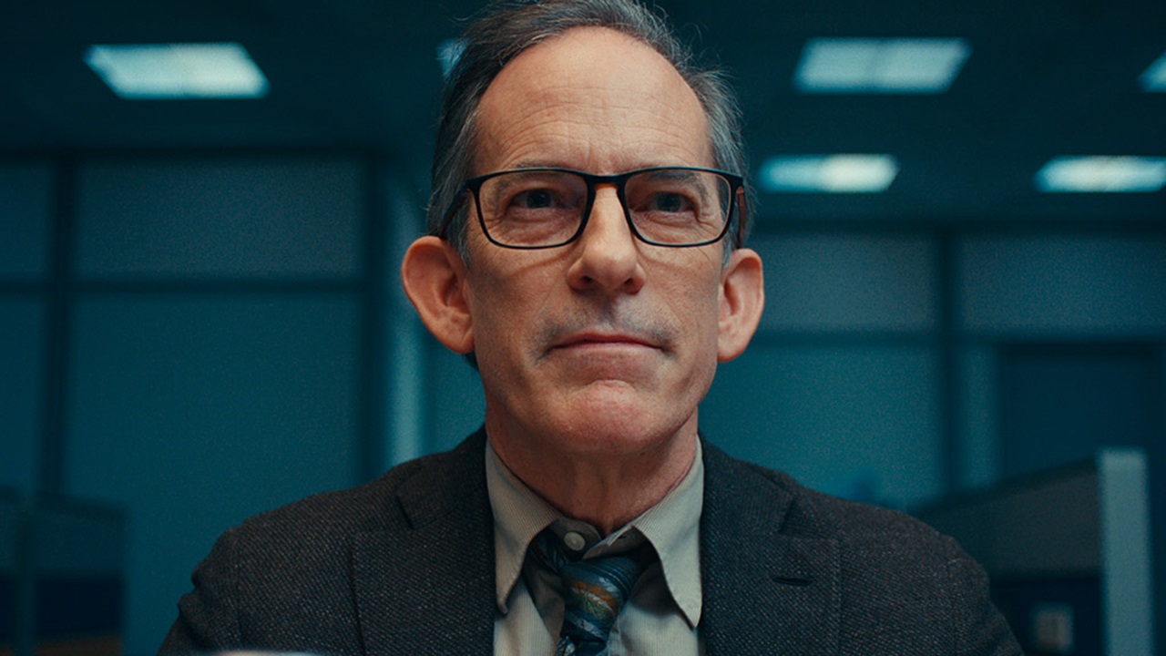 A man with glasses.